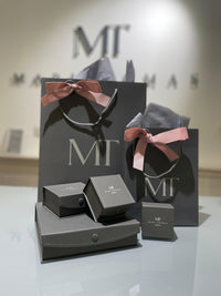 Packaging and boxes for Linear Fine welsh gold ring handcrafted in rose red gold and made in Wales