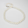 White pearl necklace with silver clasp