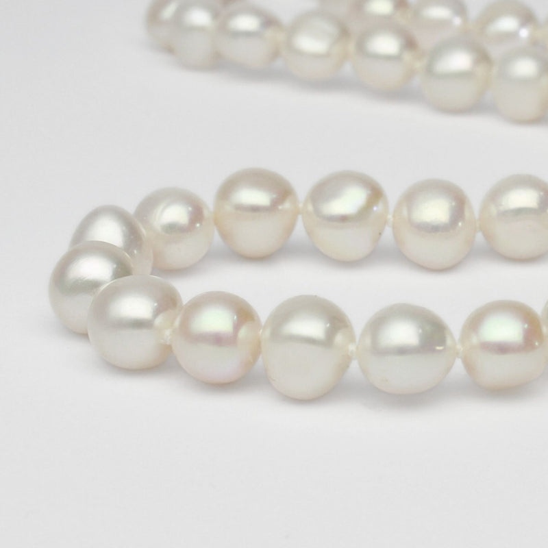 White pearl necklace with silver clasp