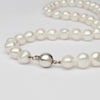 White pearl necklace with silver clasp