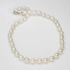 white barrel pearl necklace with silver clasp