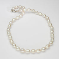 white barrel pearl necklace with silver clasp