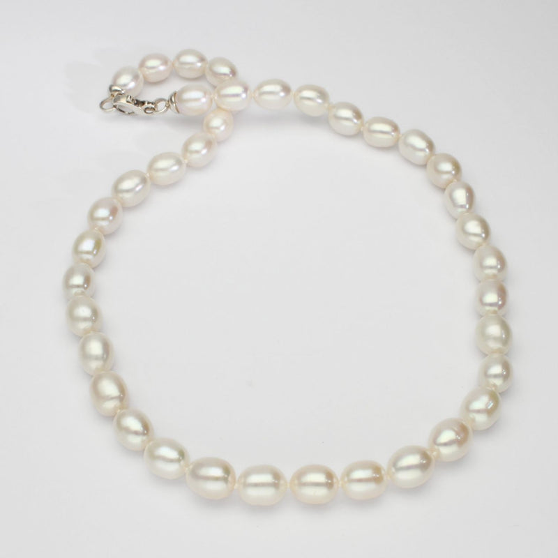 white barrel pearl necklace with silver clasp
