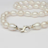 white barrel pearl necklace with silver clasp