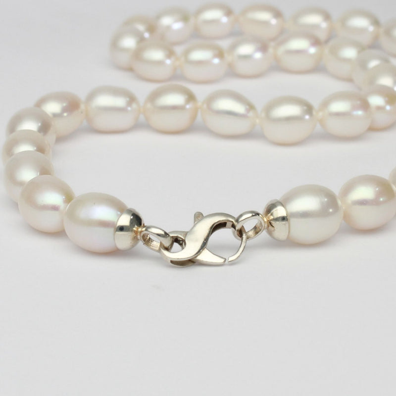 white barrel pearl necklace with silver clasp