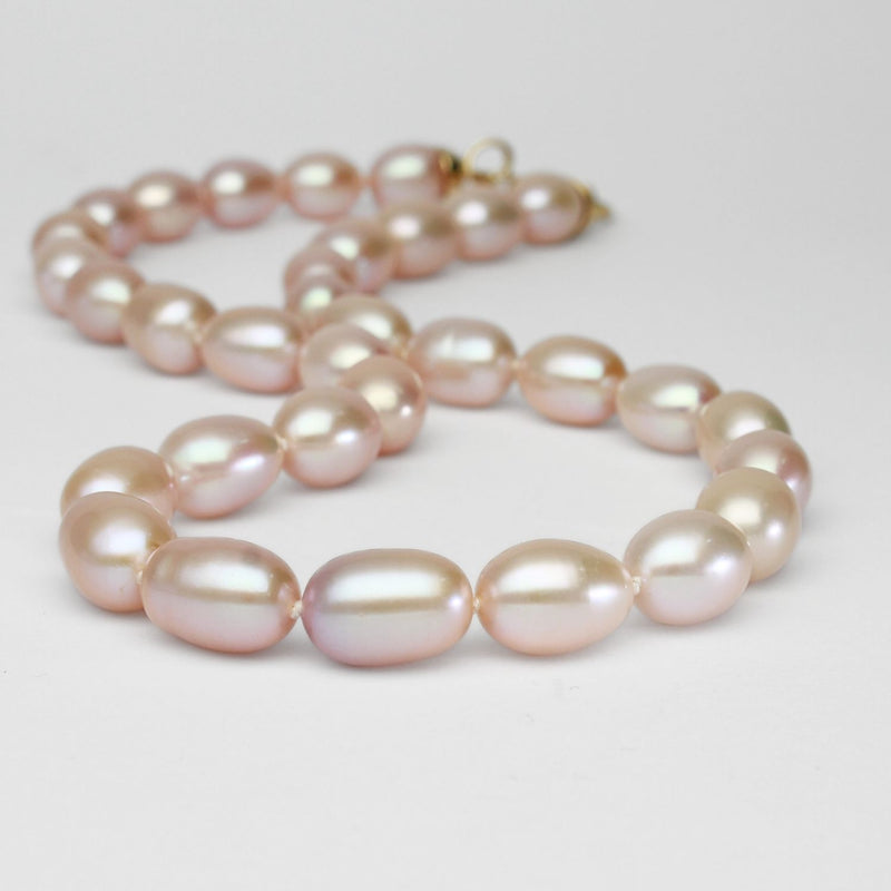 Pink barrel pearl necklace with silver gold plated clasp