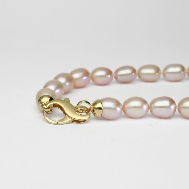 Pink barrel pearl necklace with silver gold plated clasp
