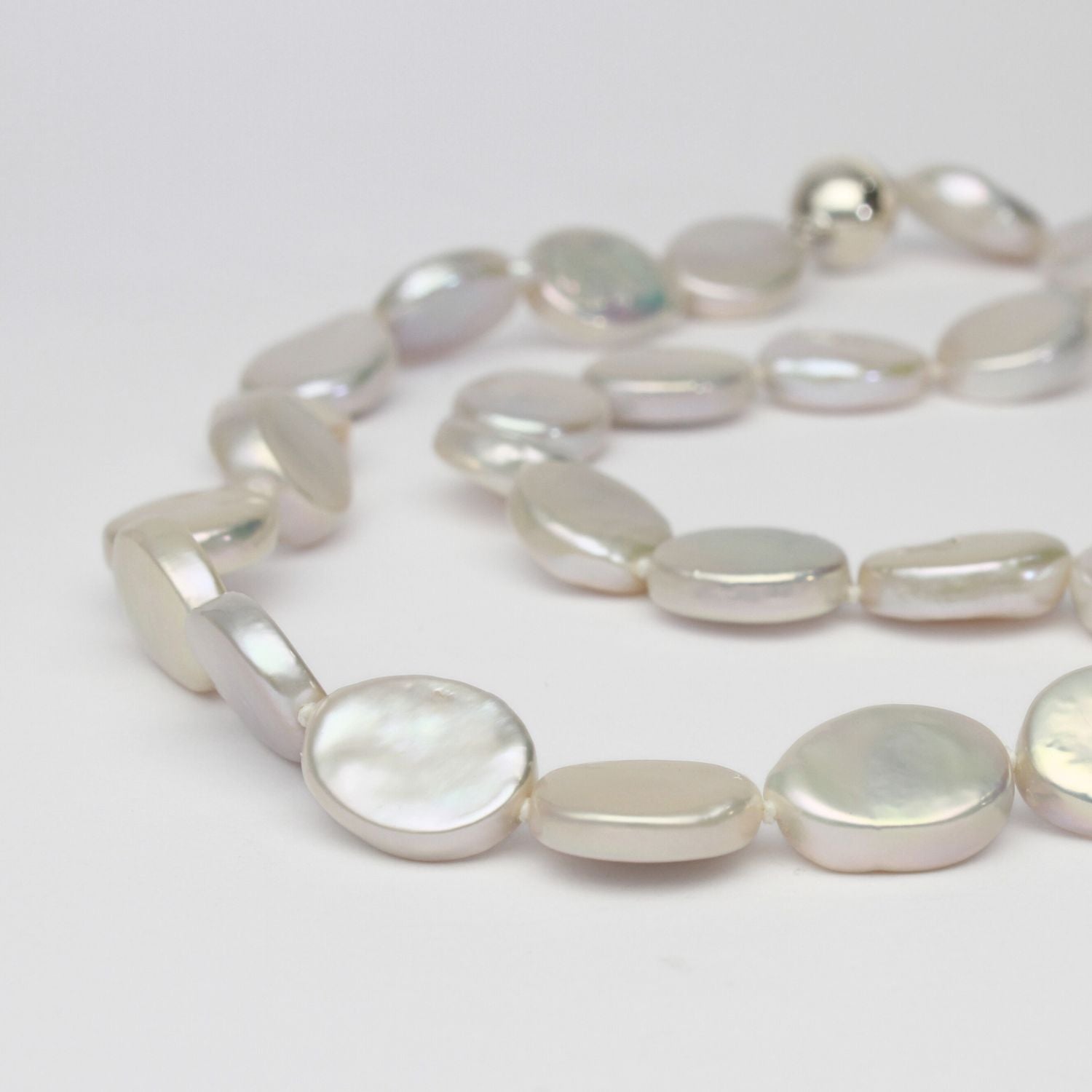 White oval coin pearl necklace with silver magnetic clasp