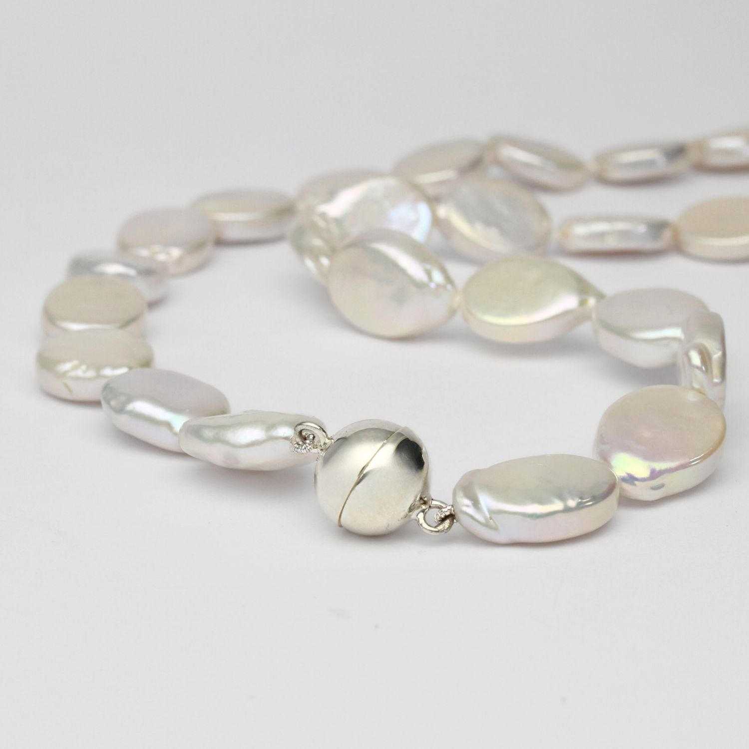 White oval coin pearl necklace with silver magnetic clasp