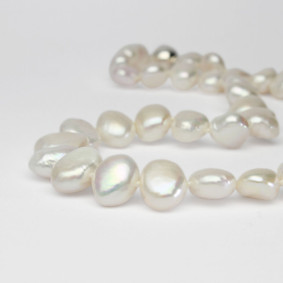 White baroque pearl necklace with silver magnetic clasp