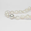 White baroque pearl necklace with silver magnetic clasp
