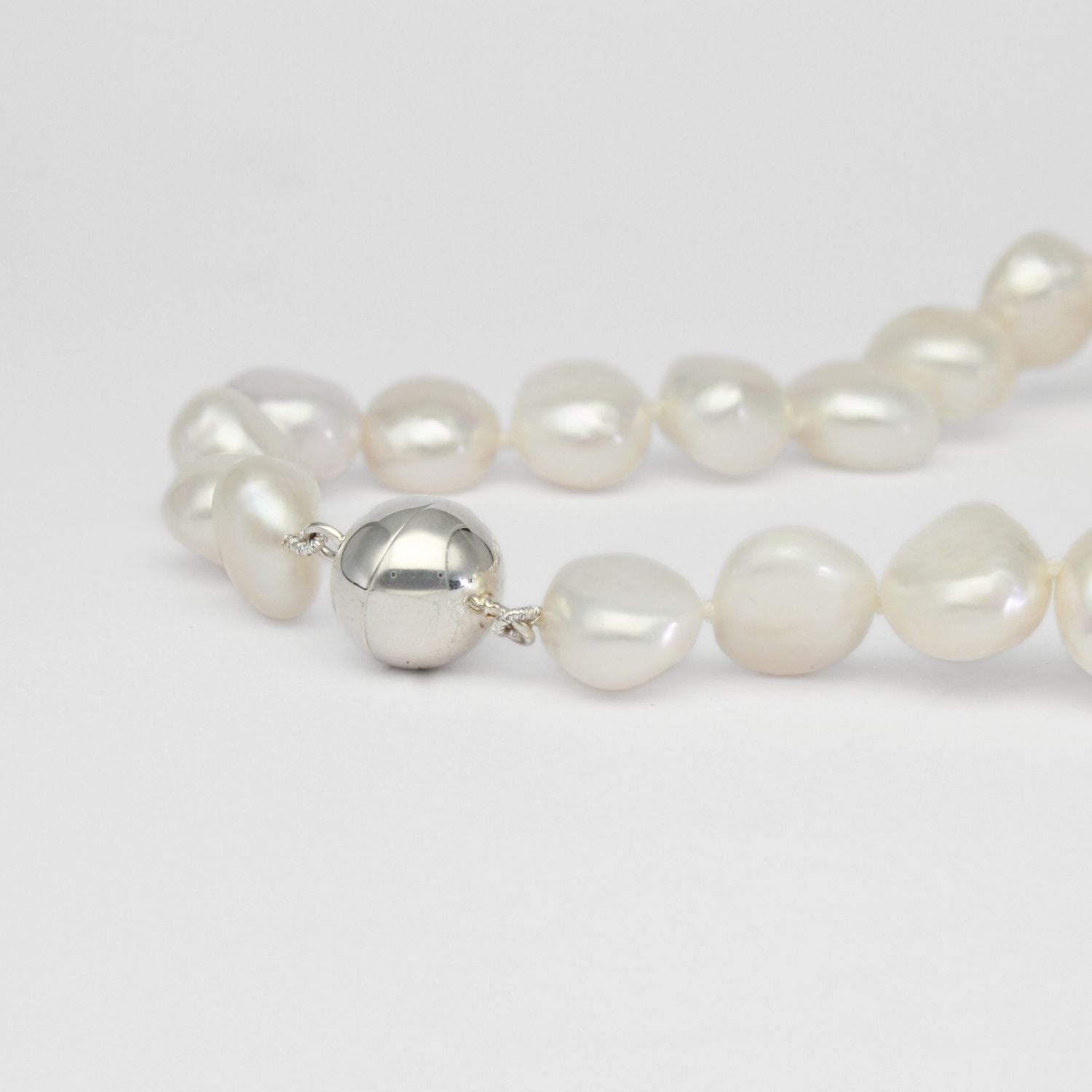 White baroque pearl necklace with silver magnetic clasp