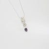 Long twizzle pendant with peacock pearl by Suzie Horan