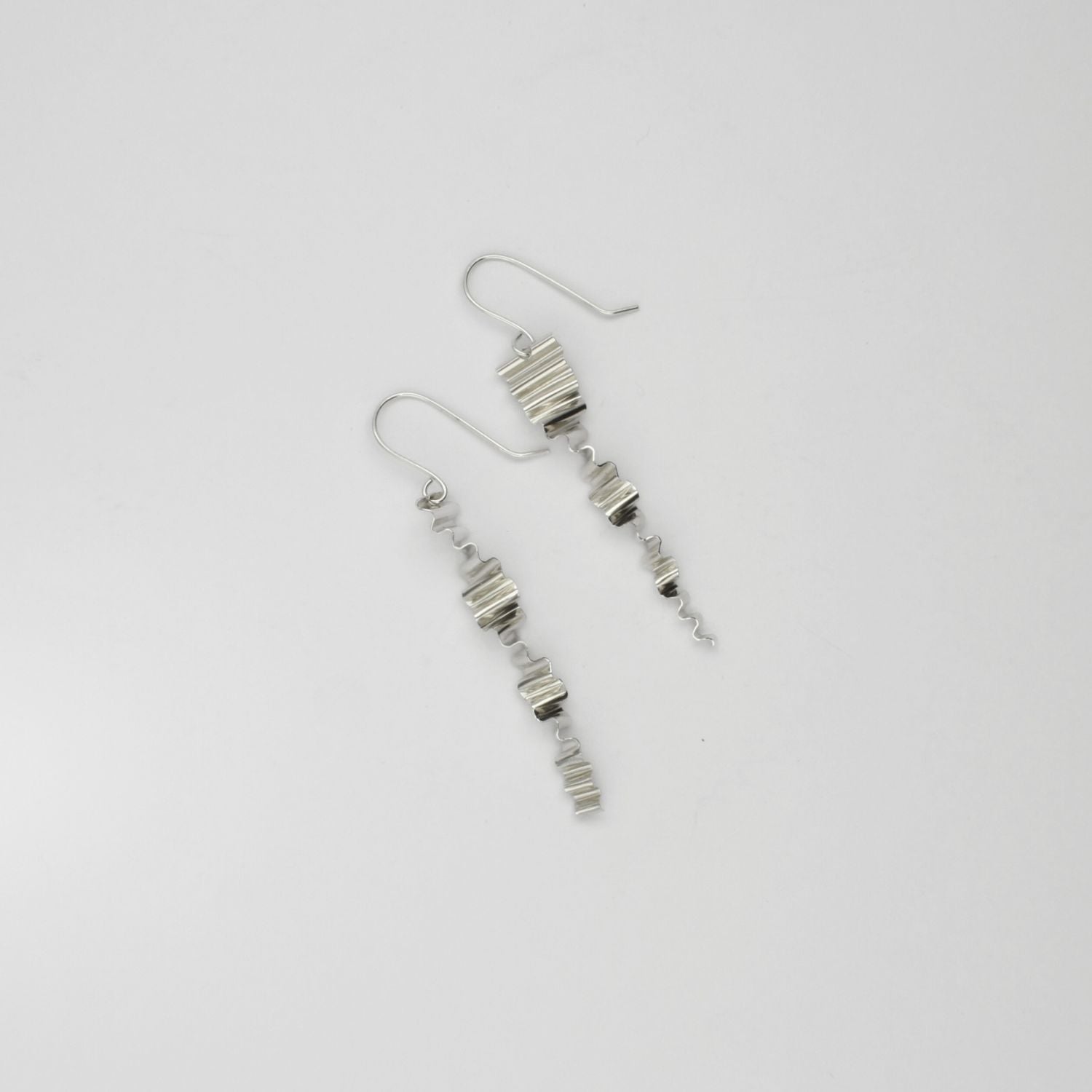Medium silver ripple twist earrings by Suzie Horan