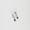 Long twizzle earrings with peacock pearls by Suzie Horan
