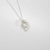 Small silver ammonite pendant by Suzie Horan