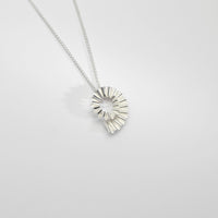 Small silver ammonite pendant by Suzie Horan