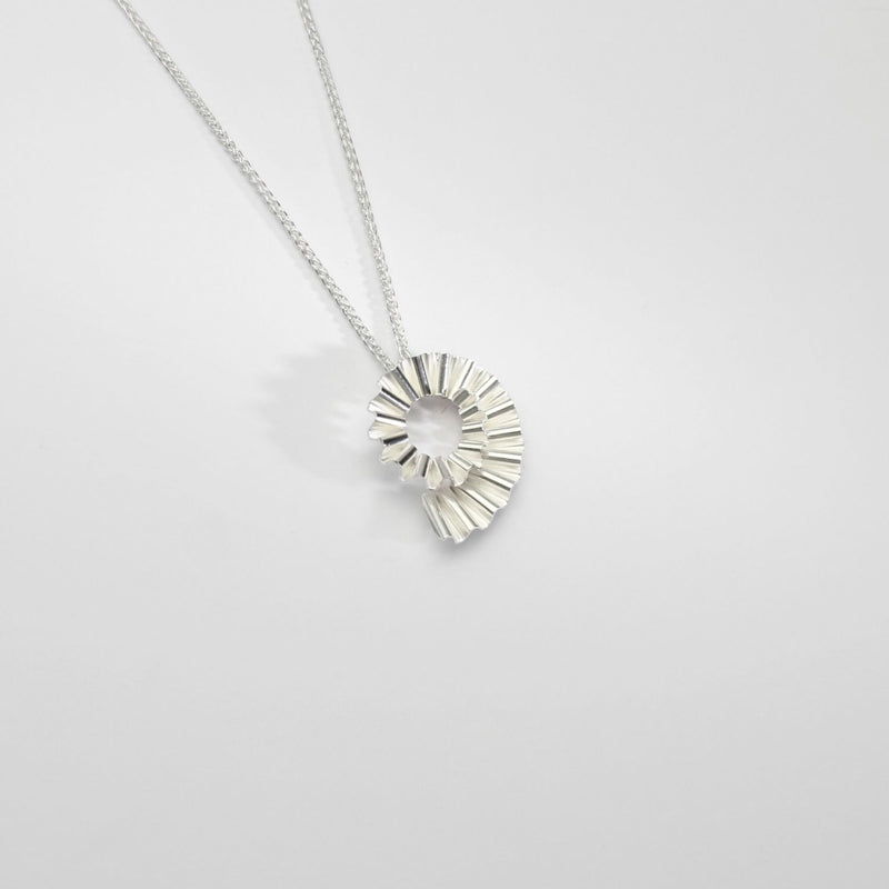 Small silver ammonite pendant by Suzie Horan
