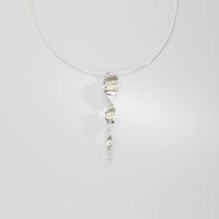 Silver long ripple twist pendant by Suzie Horan