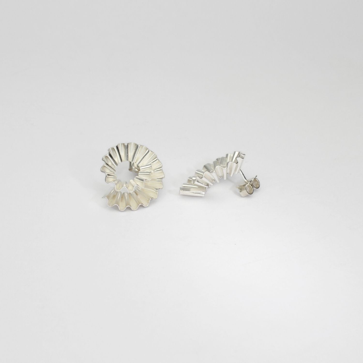 Silver ammonite earrings by Suzie Horan