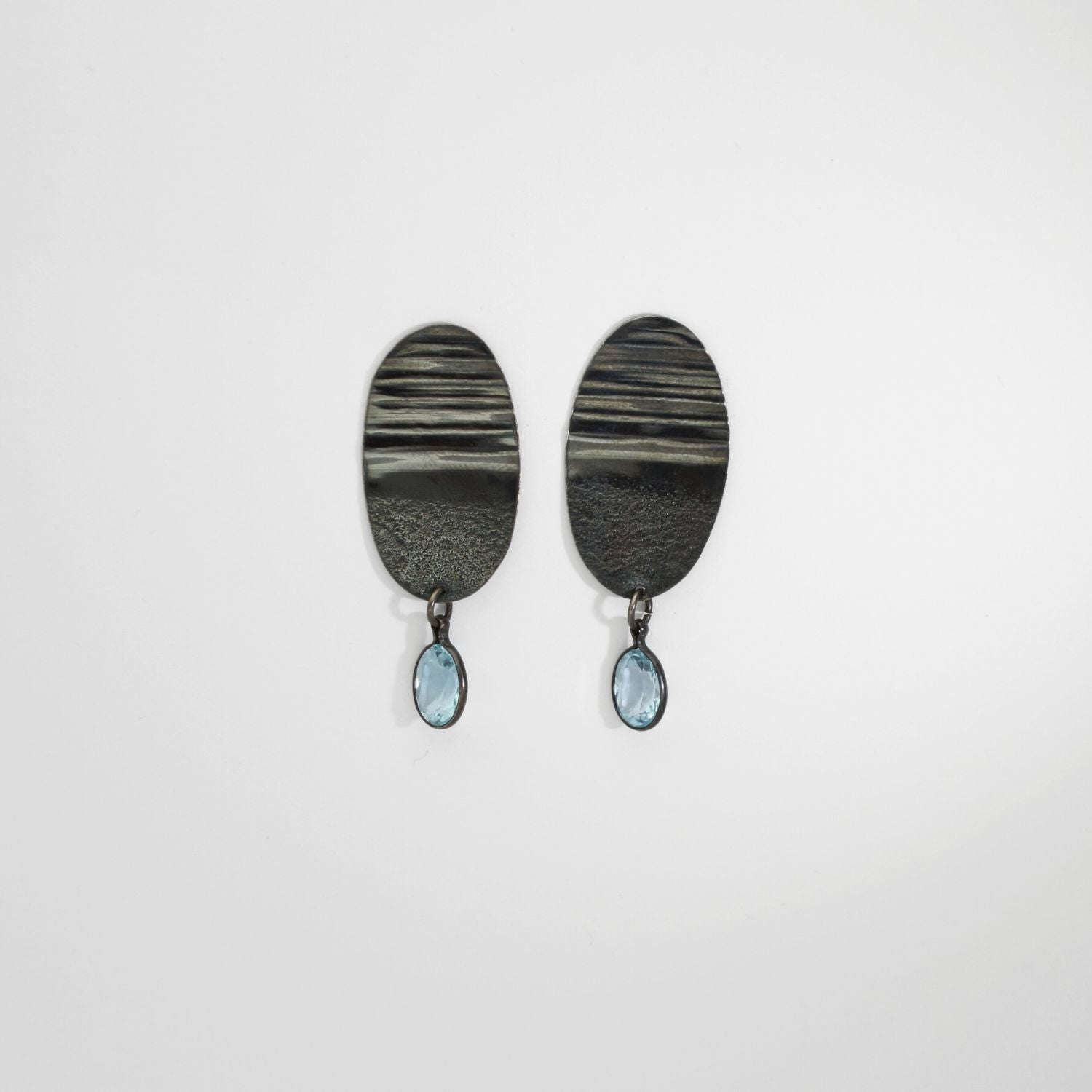 Black silver drop earrings with blue topaz by Suzie Horan