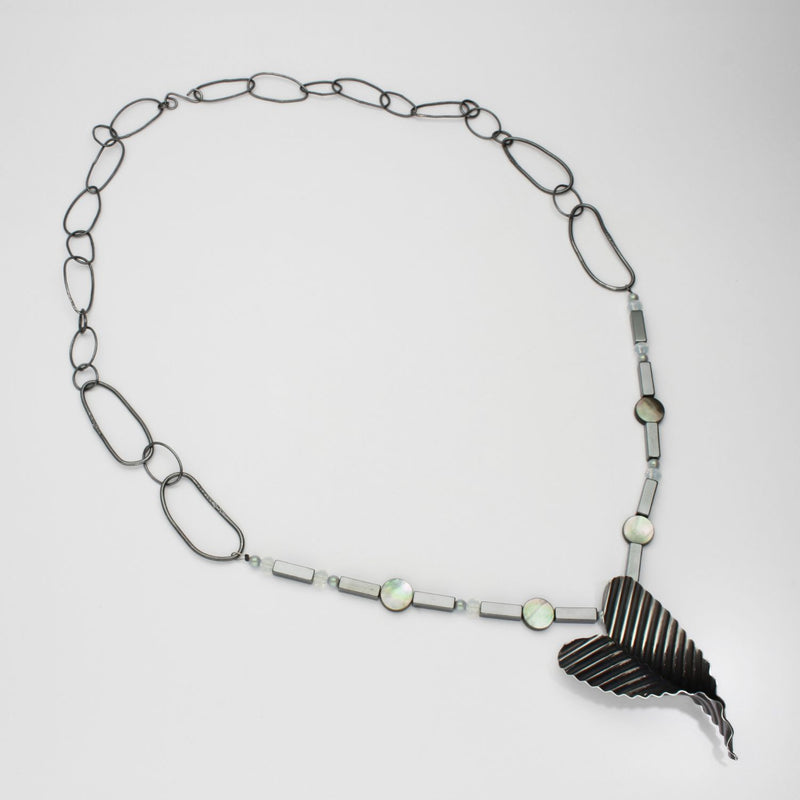 Large ripple heart necklace with opalite and hematite black silver by Suzie Horan