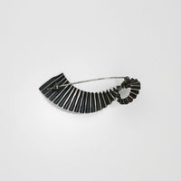 Wave brooch black silver by Suzie Horan