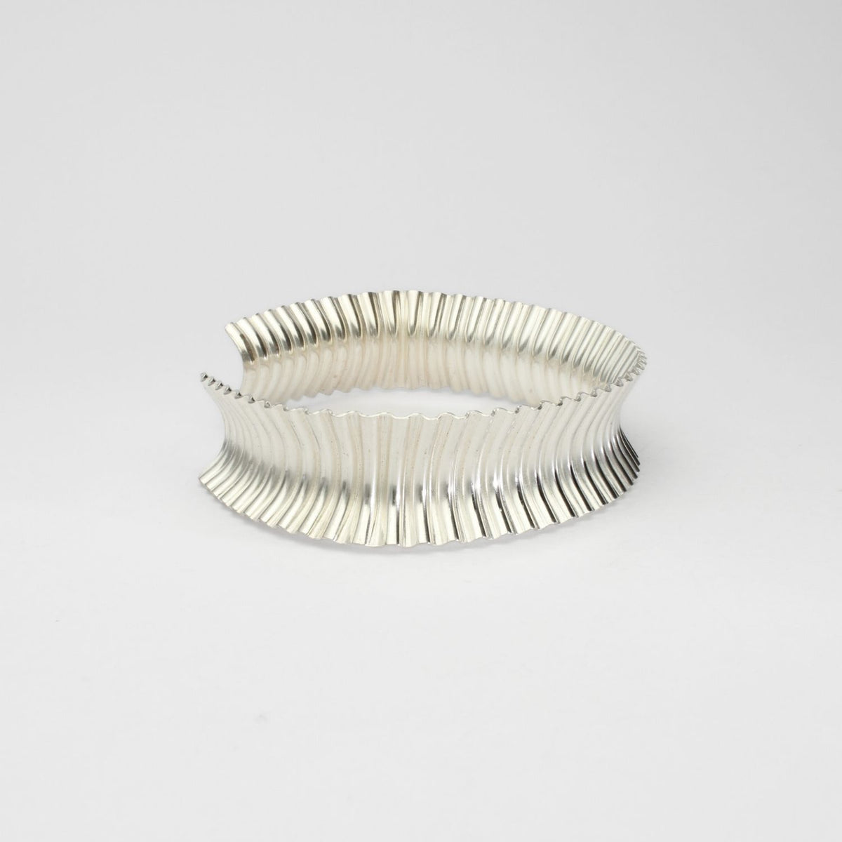 Bangle: Ammonite cuff bangle in silver Suzie Horan