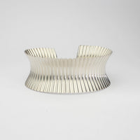 Silver ammonite cuff bangle by Suzie Horan