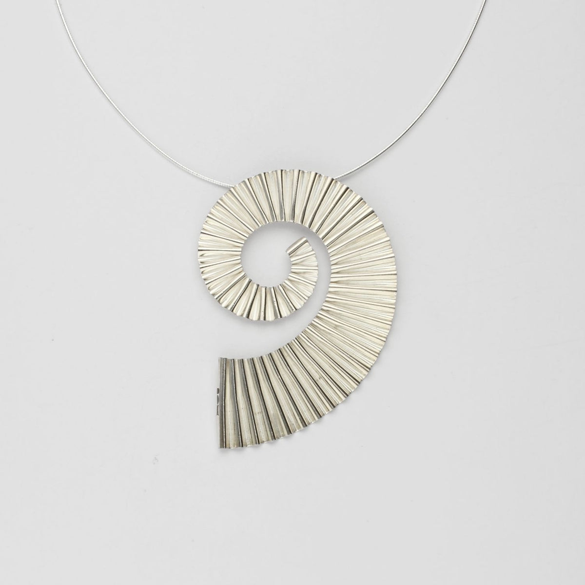 Large ammonite pendant in silver by Suzie Horan