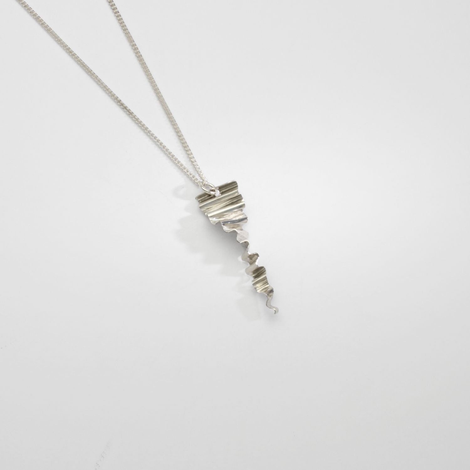 Small ripple silver pendant by Suzie Horan