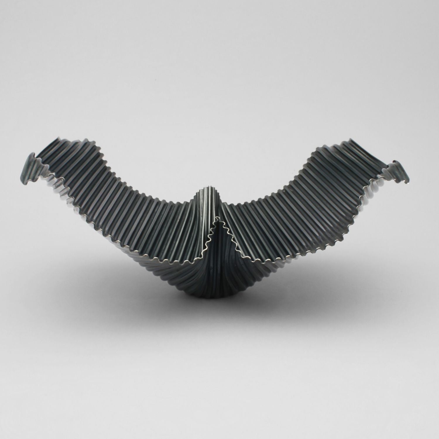 Whaletail black silver dish by Suzie Horan