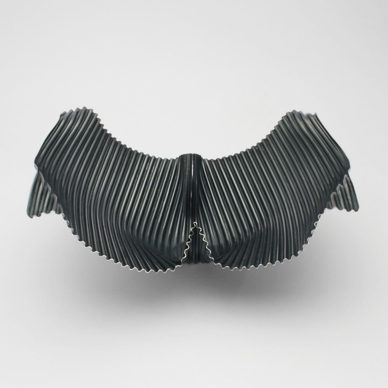 Whaletail black silver dish by Suzie Horan