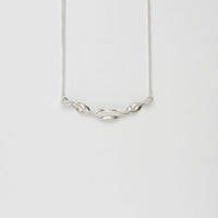 Spring leaf ribbon twist small silver necklace by Yelland and Barker