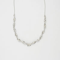Spring leaf small twist half silver necklace by Yelland & Barker