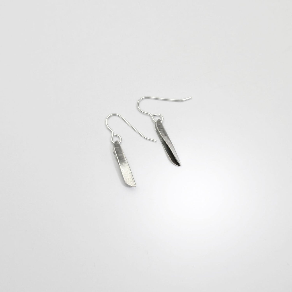 Willow leaf slimline small silver earrings by Yelland and Barker