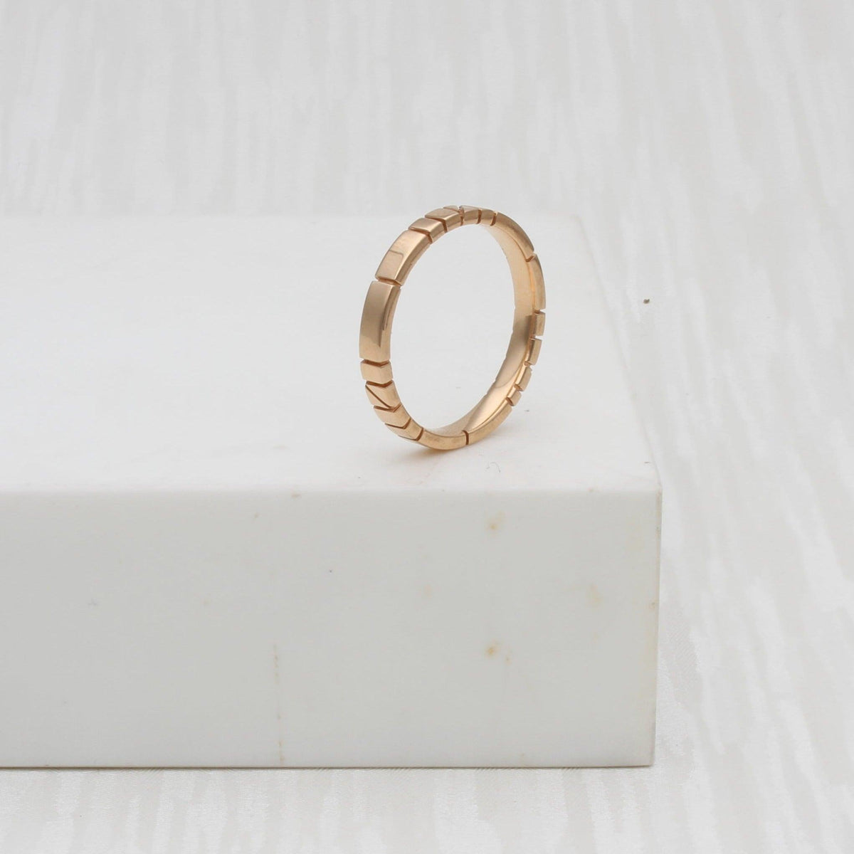 Welsh gold ring inspired by the strata of Welsh slate handcrafted and handmade in 18ct rose red gold 
