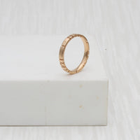 Welsh gold ring inspired by the strata of Welsh slate handcrafted and handmade in 18ct rose red gold 