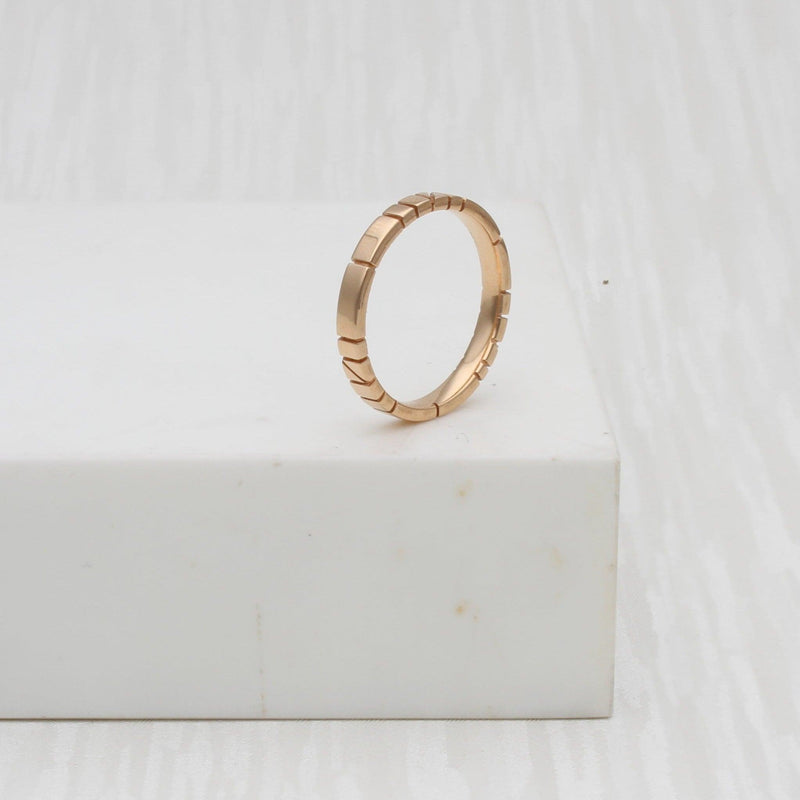 Welsh gold ring inspired by the strata of Welsh slate handcrafted and handmade in 18ct rose red gold 