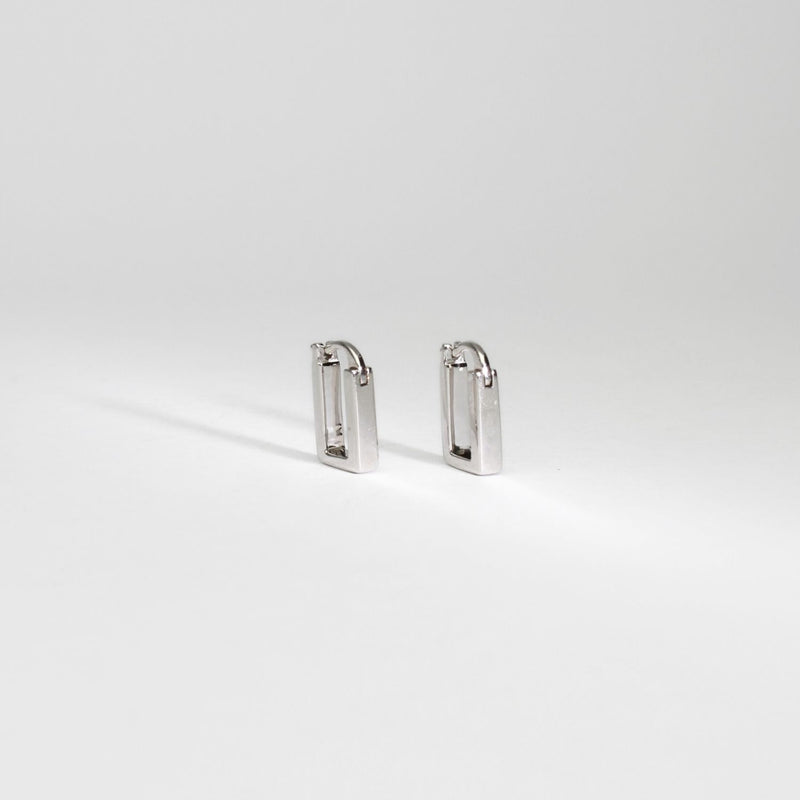 Rectangular silver hoop earrings by Yuki Mitsuyasu