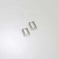 Rectangular silver hoop earrings by Yuki Mitsuyasu