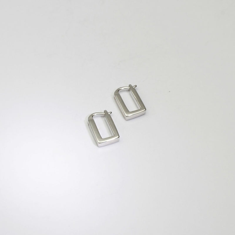Rectangular silver hoop earrings by Yuki Mitsuyasu