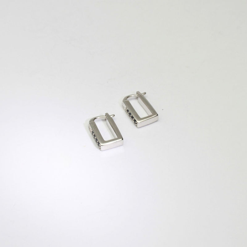 Rectangular silver hoop earrings with sapphires by Yuki Mitsuyasu