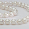 Big silver star on 30' pearl necklace by Yuki Mitsuyasu