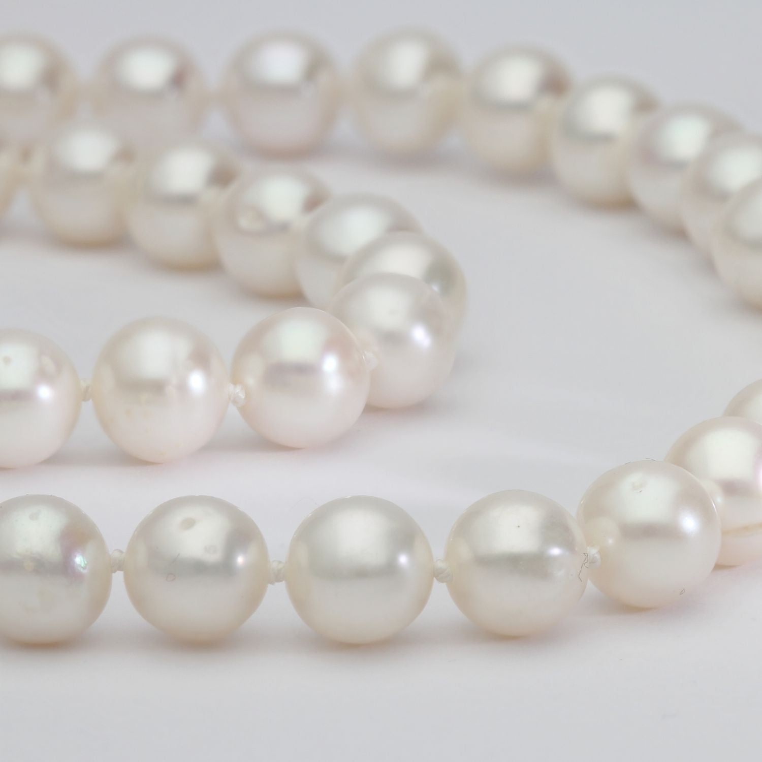 Big silver star on 30' pearl necklace by Yuki Mitsuyasu