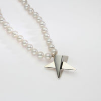 Big silver star on 30' pearl necklace by Yuki Mitsuyasu