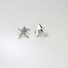 Star stud earrings in silver by Yuki Mitsuyasu