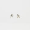 Mini silver star studs by Yuki Mitsuyasu