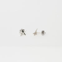 Mini silver star studs by Yuki Mitsuyasu