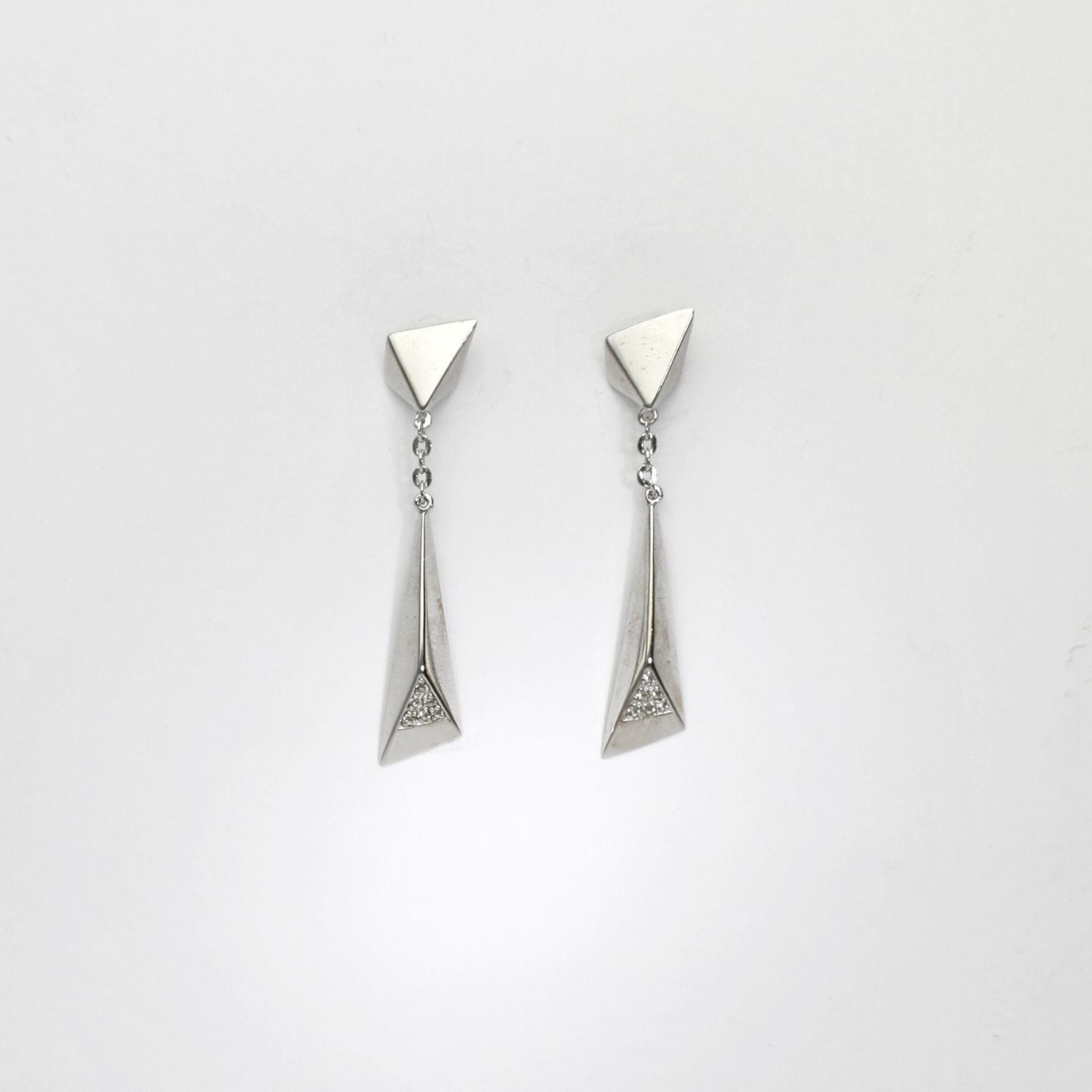 Shooting star silver stud earrings with white topaz by Yuki Mitsuyasu